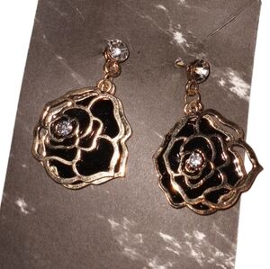 black and gold toned rose dangle earrings